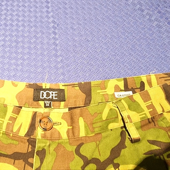 size 34x32 Dope Camouflage cargo tapperd fit pant and fits nice. - Picture 3 of 8